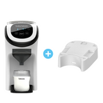 Die Babybrezza.de Formula Pro Mini inkl. Zusätzlicher Sockel für größere Flaschen ist mit einem durchsichtigen, mit Milch gefüllten Behälter und einem weißen Aufsatzstück abgebildet. Ein blaues Pluszeichen weist auf die kombinierte Verwendung für eine optimierte Milchflaschenbereitung hin. - product thumbnail