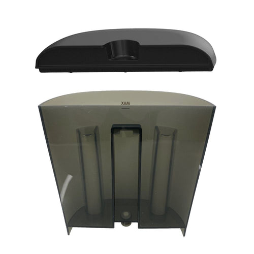 Ein schwarzes Objekt mit gewölbter Oberseite befindet sich über einem grauen, durchscheinenden, wandmontierten Papierhandtuchspender mit zwei sichtbaren Fächern, der an das elegante Design des Formula Pro Mini Wassertanks inkl. Deckel von Baby Brezza.de erinnert. - product thumbnail